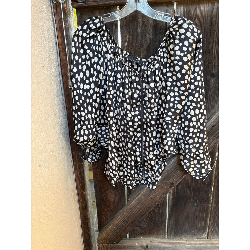 black and white polka-dot Cecico zip-front blouse